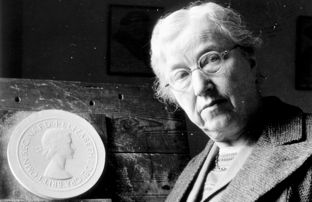 Mary Gillick standing by her portrait of Elizabeth II.jpg