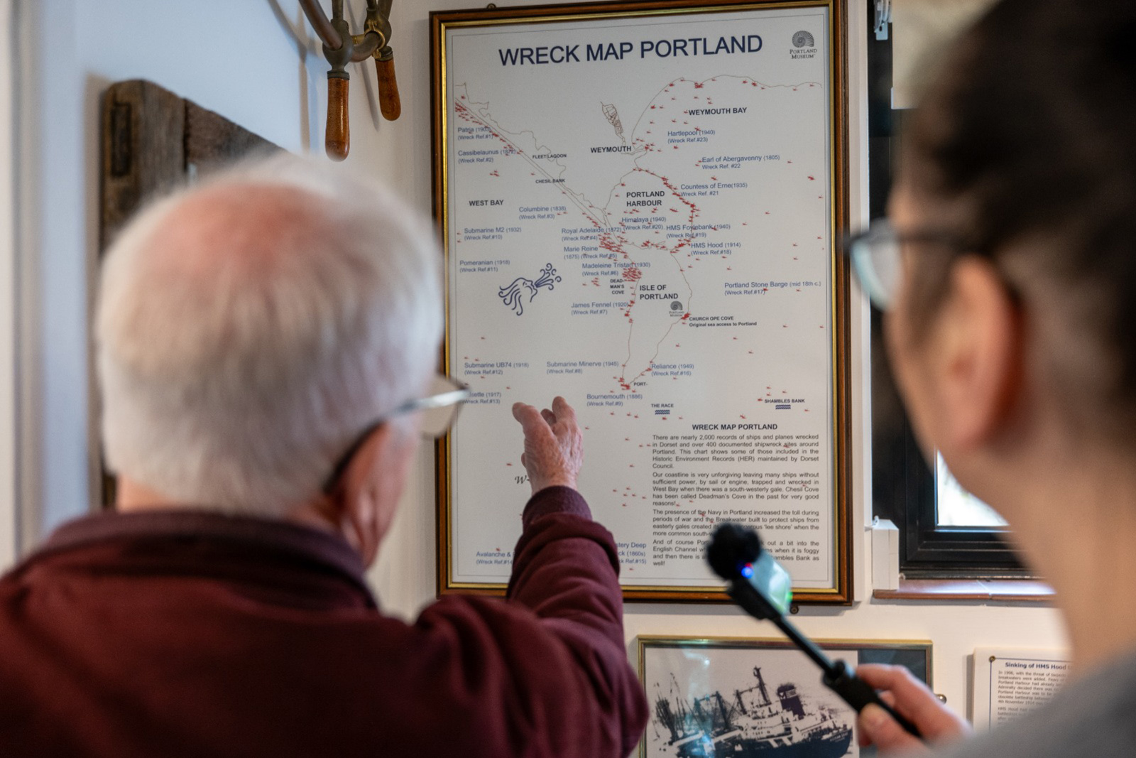 Looking at a map of Wreck Sites at Portland Museum