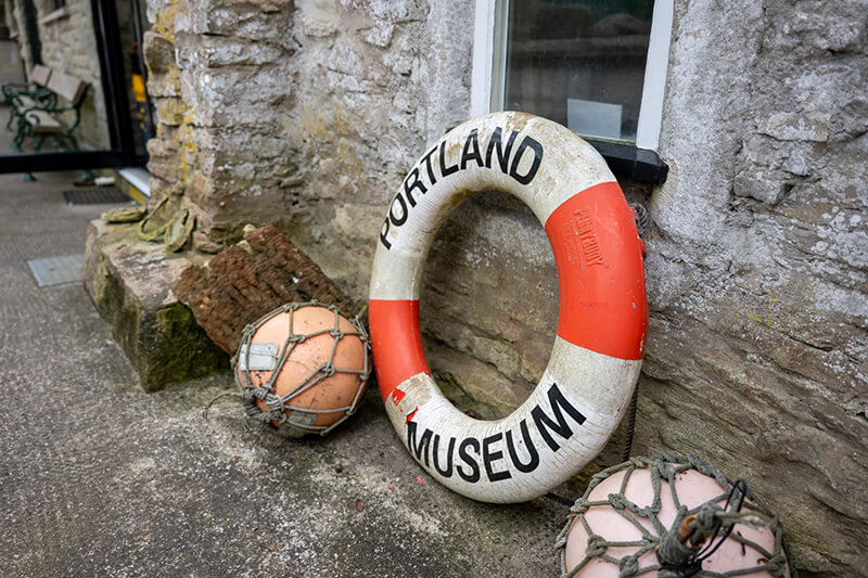 BA life bouy stamped with the words Portland Museum