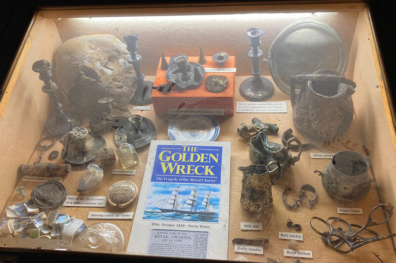 An old museum case containing shipwreck material