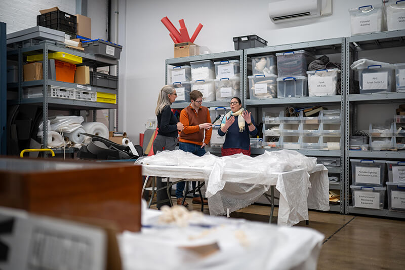 Podcast team in the store at the Museum of the Royal Navy